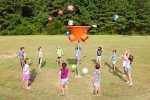 7 Foot Triple Shoot Children's Basketball Game - Inground Mount - Outdoor Hoop - Basketball Game for Children of All Ages (Orange)