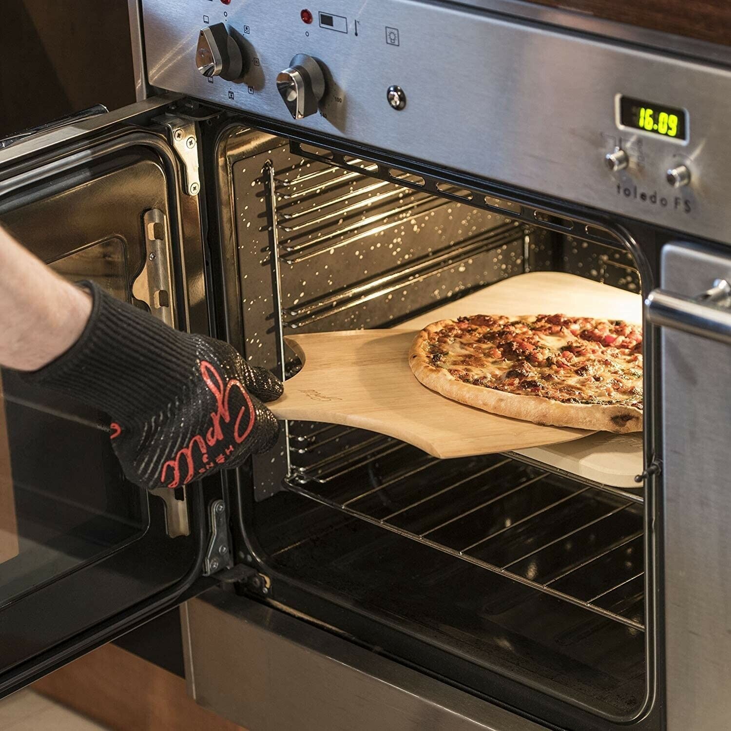 Pizza stone with free peel and cutter
