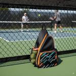 Alveroya Amber Orange Pickleball Sling Bag with Shoe Compartment for Men Women, Professional 2-3 Paddle Backpack, Large Capacity Bag with 36oz Water Bottle Pocket & Fence Hook