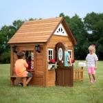 Backyard Discovery Aspen All Cedar Wooden Playhouse, Country Style, Dutch Front Door, Flower Pot Holders, Stove, Sink, Plastic Food, Doorbell, Mailbox, Outdoor Light Attached Picnic Bench