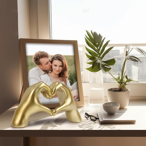 Gold Heart Finger Statue: Modern Art Sculpture Decor