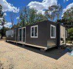 HUGHEARTS Mobile Expandable Tiny Home with Restroom