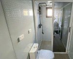 HUGHEARTS Mobile Expandable Tiny Home with Restroom