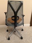 Herman Miller Sayl Chair – Orange Seat, Graphite Back