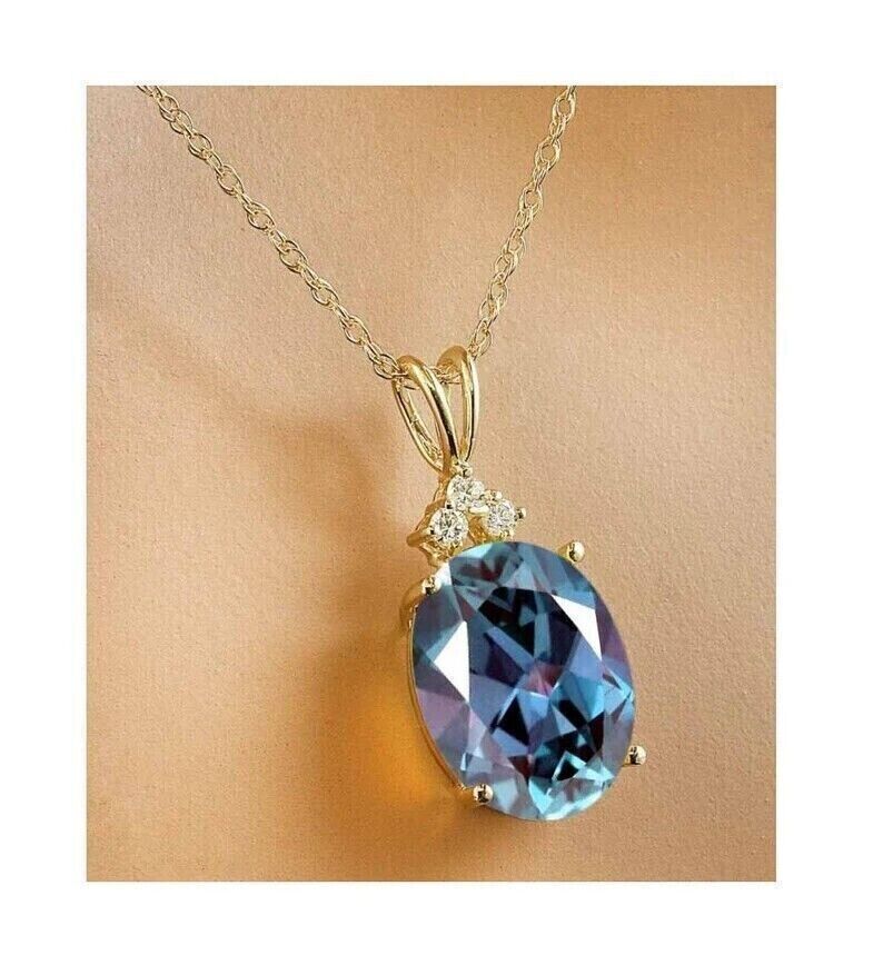 Lab created Alexandrite diamond pendant in 14K gold