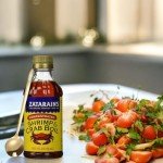 Gold Stainless Steel Spoon and Seafood Boil Liquid