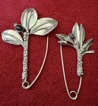 PAIR ART DECO STERLING FLORAL BROOCHES FLORAL W/BLACK STONE SCATTER PIN STYLE