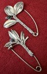 PAIR ART DECO STERLING FLORAL BROOCHES FLORAL W/BLACK STONE SCATTER PIN STYLE