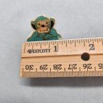 Vintage Bakelite? Plastic Brooch Turquoise Sitting Monkey Golden Outline Scarf