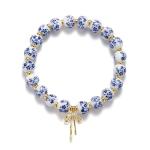 Blue Flower Charm Bracelet with Bow and Beads