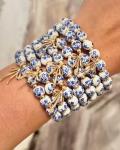 Blue Flower Charm Bracelet with Bow and Beads