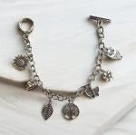 Silvertone Charm Bracelet with Toggle Closure