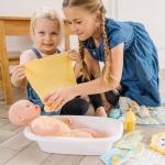 Melissa & Doug Deluxe Baby Care Play Set