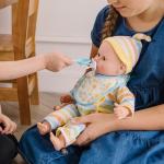 Melissa & Doug Deluxe Baby Care Play Set